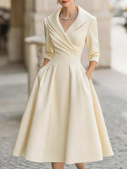 Karen – Elegant satinkjole med slå-om-look