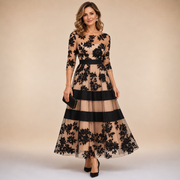 Adrielle | Elegant kjole med blomsterblonder