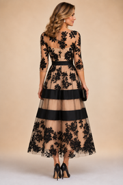 Adrielle | Elegant kjole i blomsterblonder