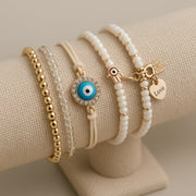 Elegant guldarmbåndssæt med hamsa