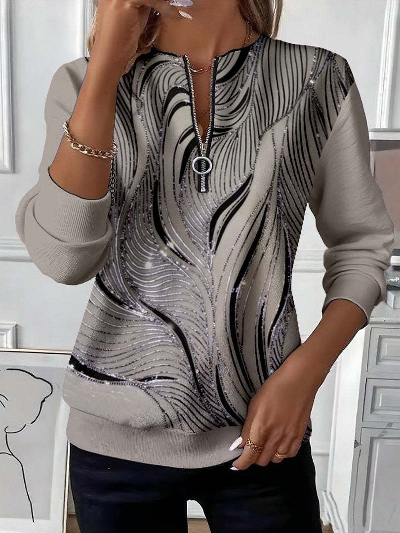 Ingrid – Sweatshirt med lynlås og glitrende bølgemønster