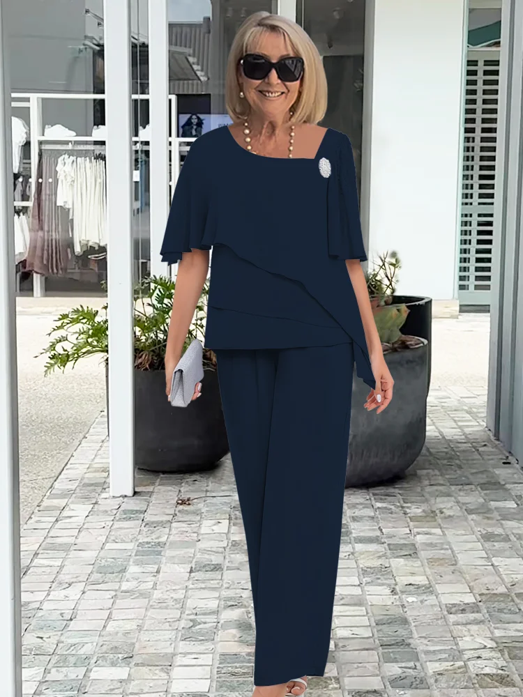 Ninon | Sæt med asymmetrisk lagdelt bluse og bukser med vide ben