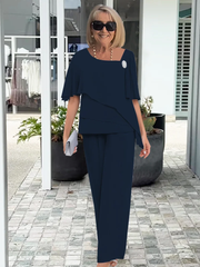 Ninon | Sæt med asymmetrisk lagdelt bluse og bukser med vide ben