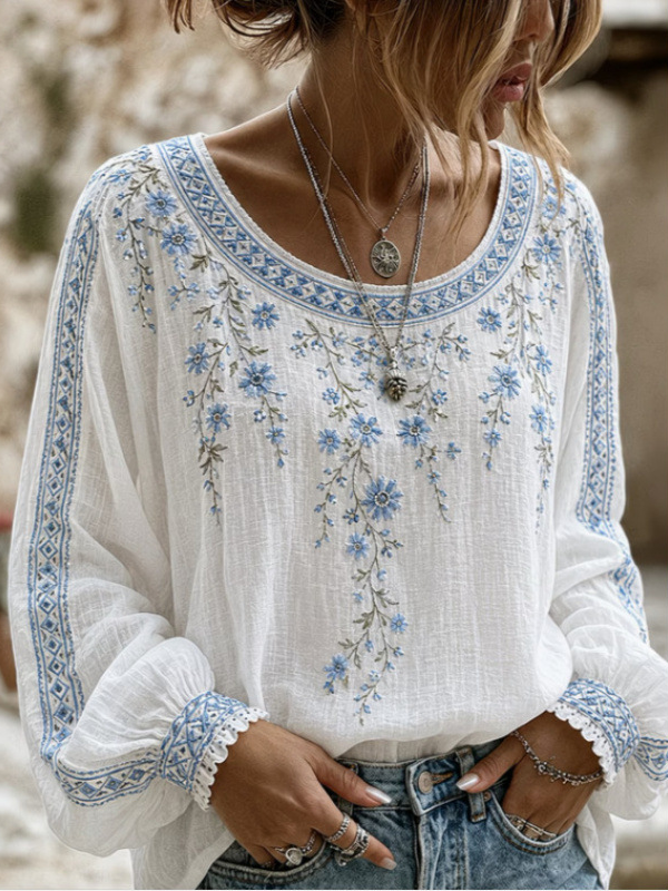 Elise™ | Blomstret bluse med blåt broderi